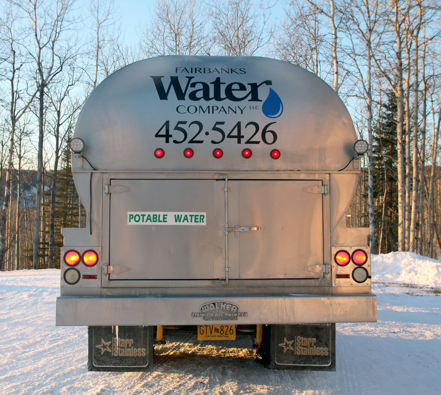 Fairbanks Water Co. delivery truck pulling away